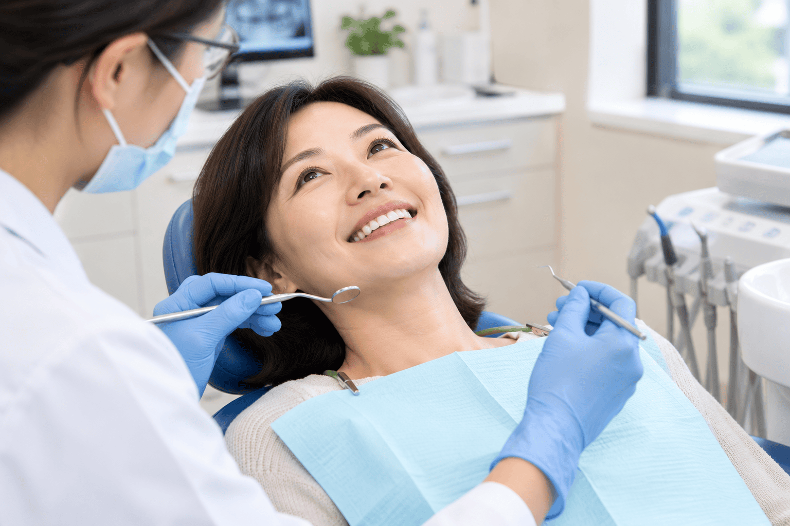 Smiling patient relaxing in the dental chair during a checkup