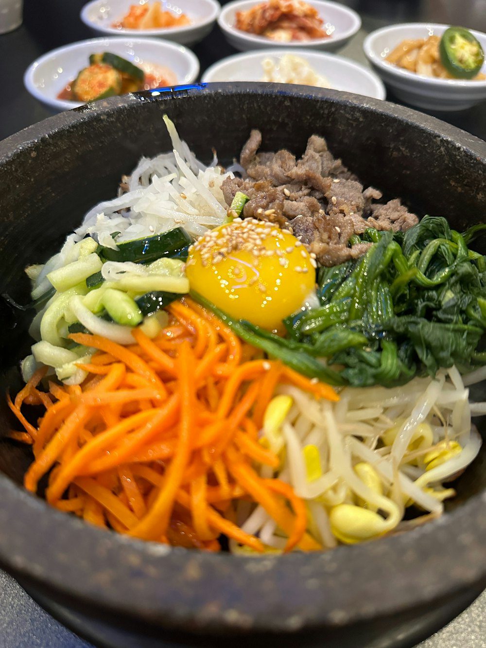 Stone-bowl bibimbap with vegetables and gochujang